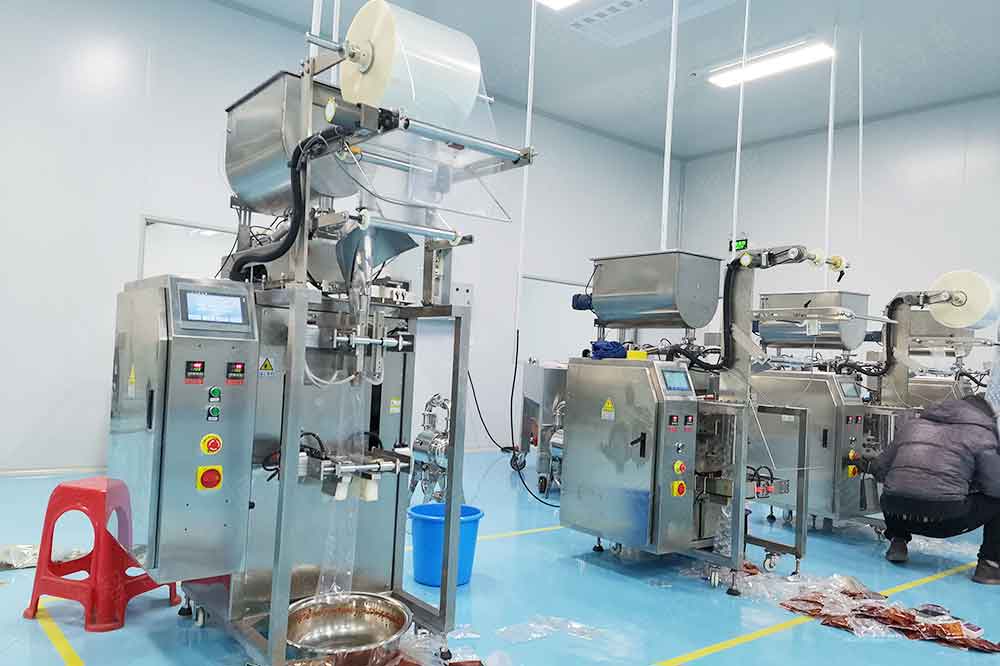 全自動(dòng)火鍋底料包裝機(jī)用于火鍋料、豆瓣醬、辣椒醬等等產(chǎn)品包裝